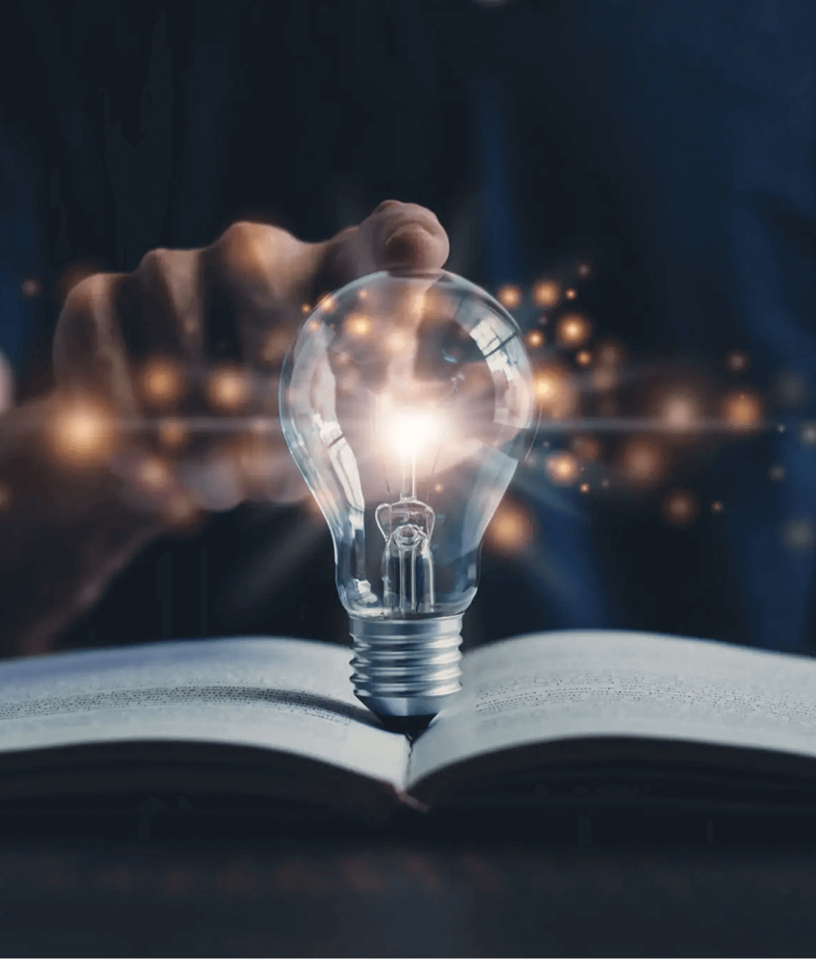 Light bulb on open book