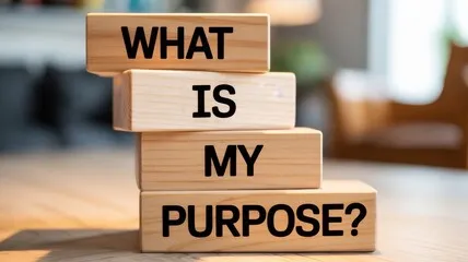 Stacked wooden blocks ask, 'What is my purpose?'